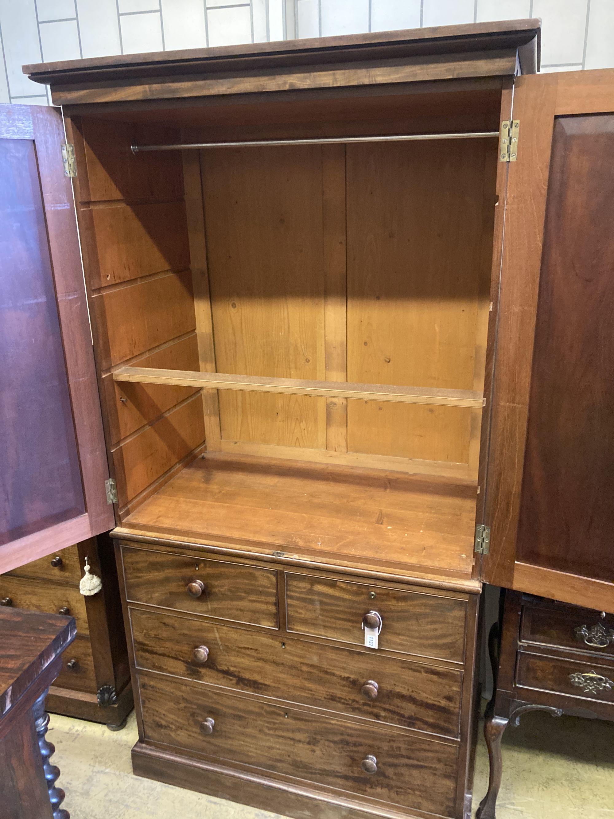 A Victorian mahogany linen press, formerly part of a larger wardrobe, width 112cm depth 66cm height 212cm